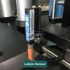 Automatic round bottle labeling machine