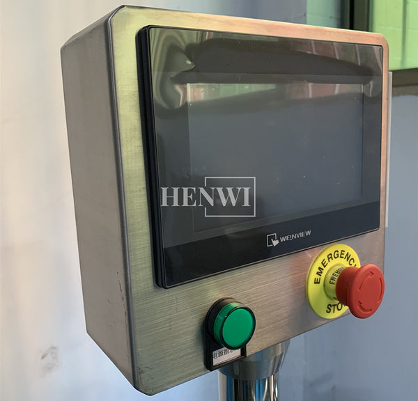 Automatic top side labeling machine