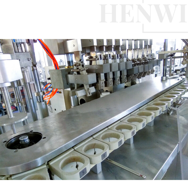 Automatic high speed tube filling and sealing machine