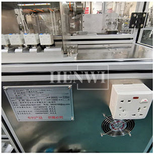 Facial mask folding and bagging machine