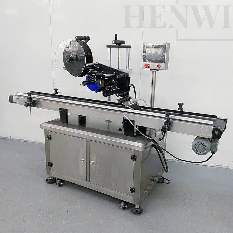 Automatic top side labeling machine