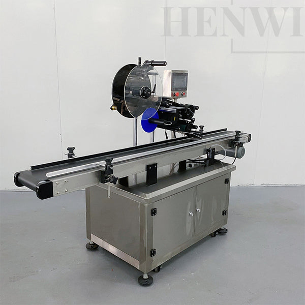 Automatic top side labeling machine